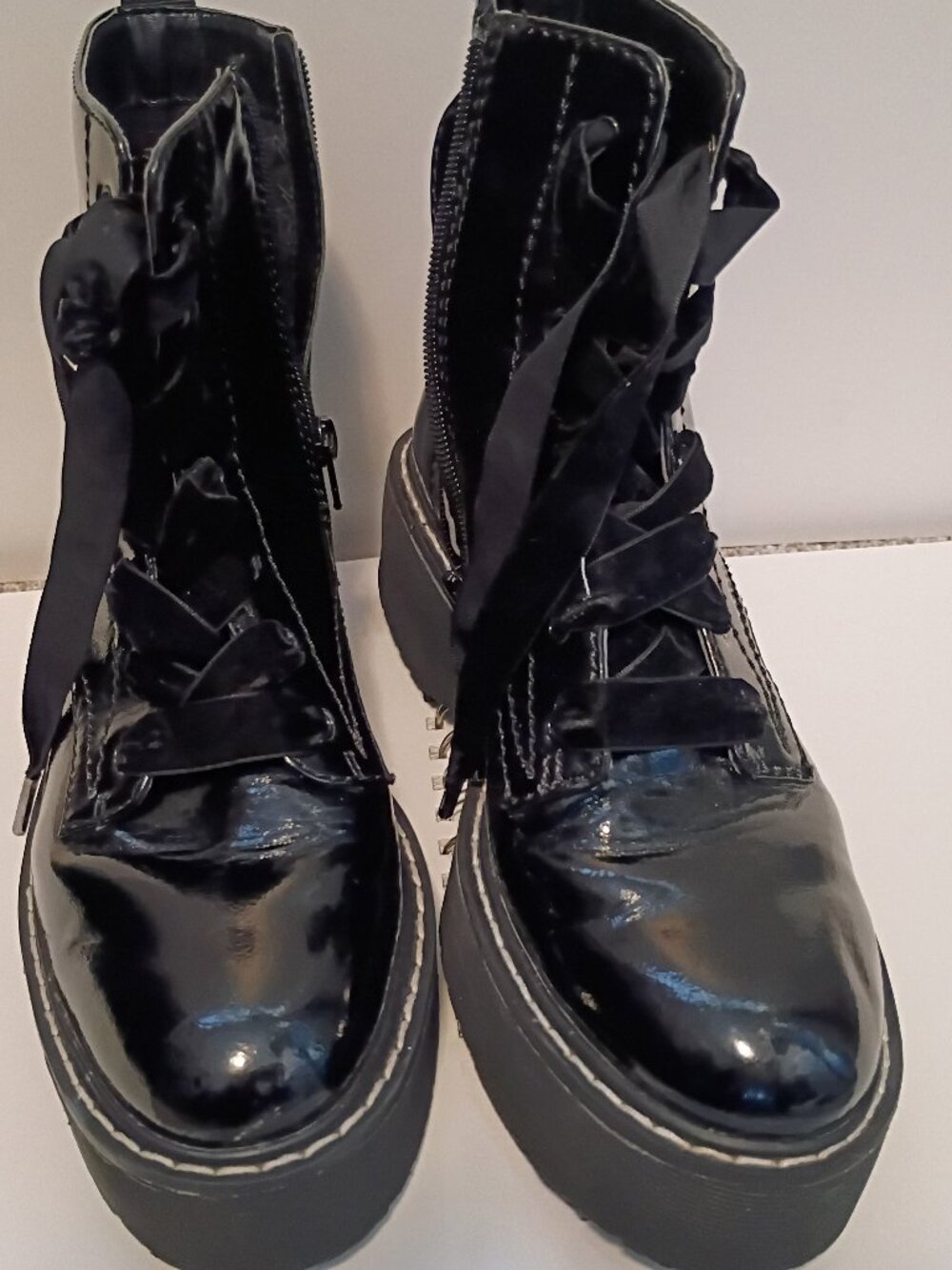Women's black shiny boots